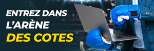Gants de boxe bleus tenant un ordinateur portable avec de l’argent en l’air.