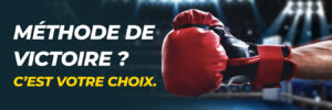 Poing avec gant de boxe rouge tendu vers l’avant sur fond de ring.